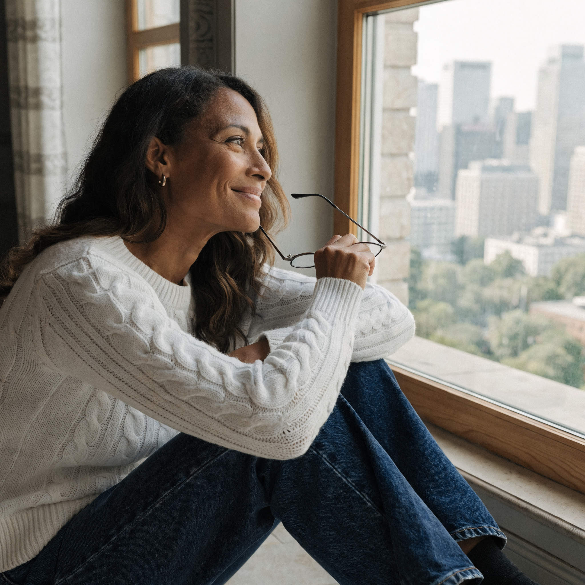 Person without glasses, natural light, confident expression